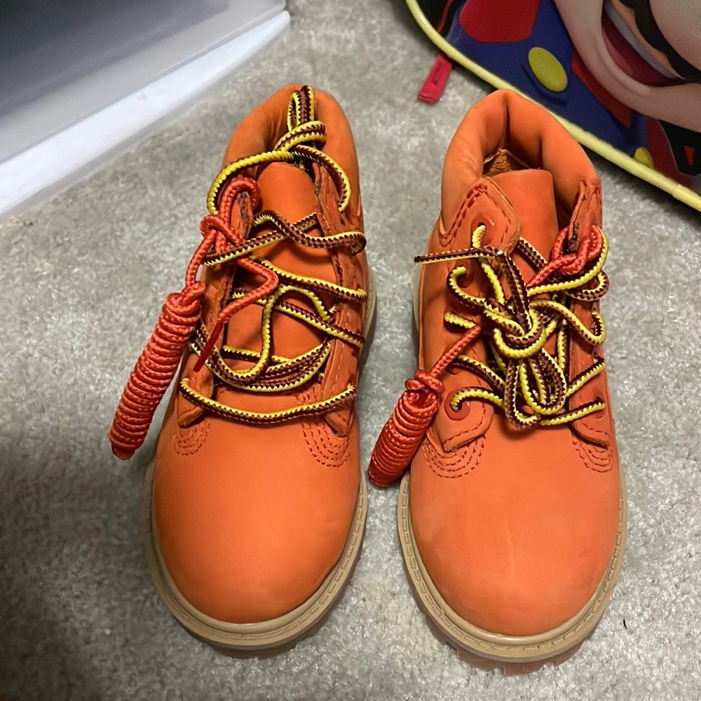 Orange infant timbs